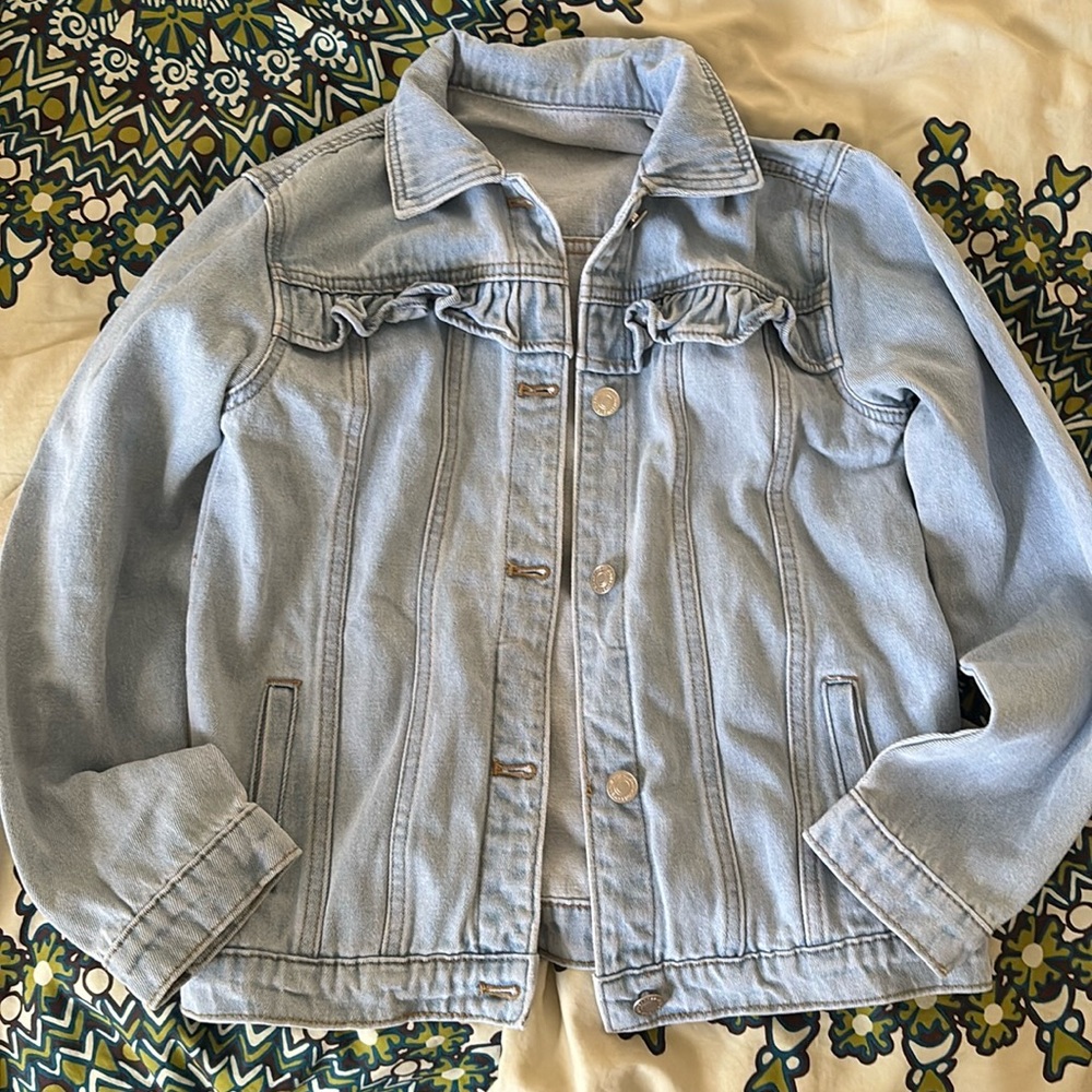 Girls size 12 Jean jacket. Excellent condition. No flaws.